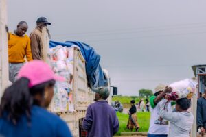 Mabvuku MP Scott Pedzai Sakupwanya handing out food hampers to local families to support households facing high living costs in Zimbabwe