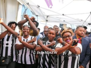 Highlanders fans celebrate after receiving bus from Wicknell Chivayo 