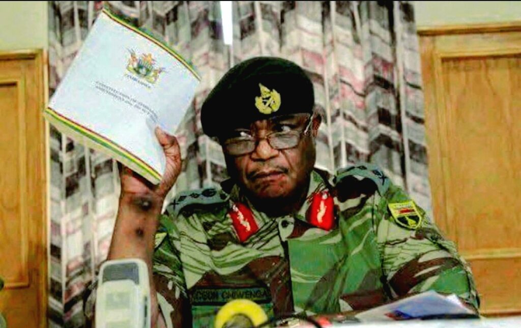 Constantino Nyikadzino Dominic Guvheya Chiwenga then Army commander holding Zimbabwe Constitution