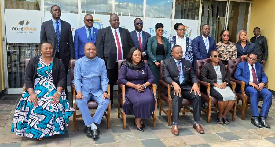 Potraz board members pose for photos with ministry of ICT officials at the ministry's head office in Harare