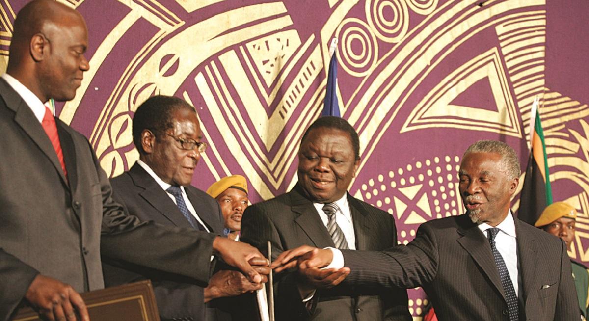 Zimbabwe Government of National Unity in 2009. Left to right: Arthur Mutambara, Robert Mugabe, Morgan Tsvangirai, and Thabo Mbeki. Mbeki who was the president of South Africa helped with negotiations.