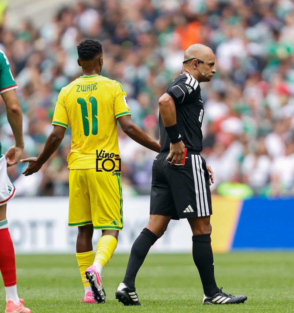 Veteran south african midfielder Themba Zwane shown red card for what appears to be a slap on opponent's face during 2026 World Cup opener against Mexico
