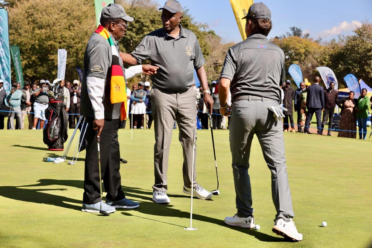 President Emmerson Mnangagwa plays golf with Kuda Tagwirei a business man and oil mogul